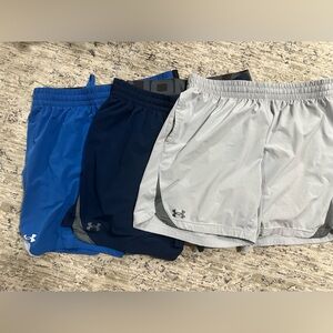 Three pairs of men’s under Armour shorts, all extra large